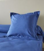 Taie de traversin uni en coton coloris bleu jean 43x140 - Sylvie Thiriez