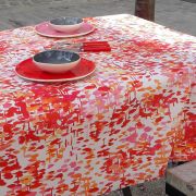 Nappe Reflets flamboyants coton enduit ourlée 120x120 - Fleur de Soleil