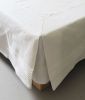 Cache-sommier uni en coton coloris blanc 180x200