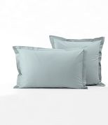 Taie d'oreiller uni en percale coloris bleu givré 40x40 - Sylvie Thiriez