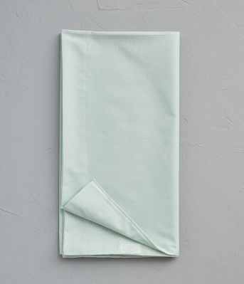 Taie de traversin uni en coton coloris Vert fleur d'amandier 43x140 - Sylvie Thiriez