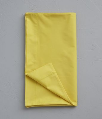 Taie de traversin uni en percale coloris jaune Abeille 43x185 - Sylvie Thiriez