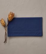 Taie de traversin uni en percale lavée coloris bleu de chauffe 43x185 - Sylvie Thiriez